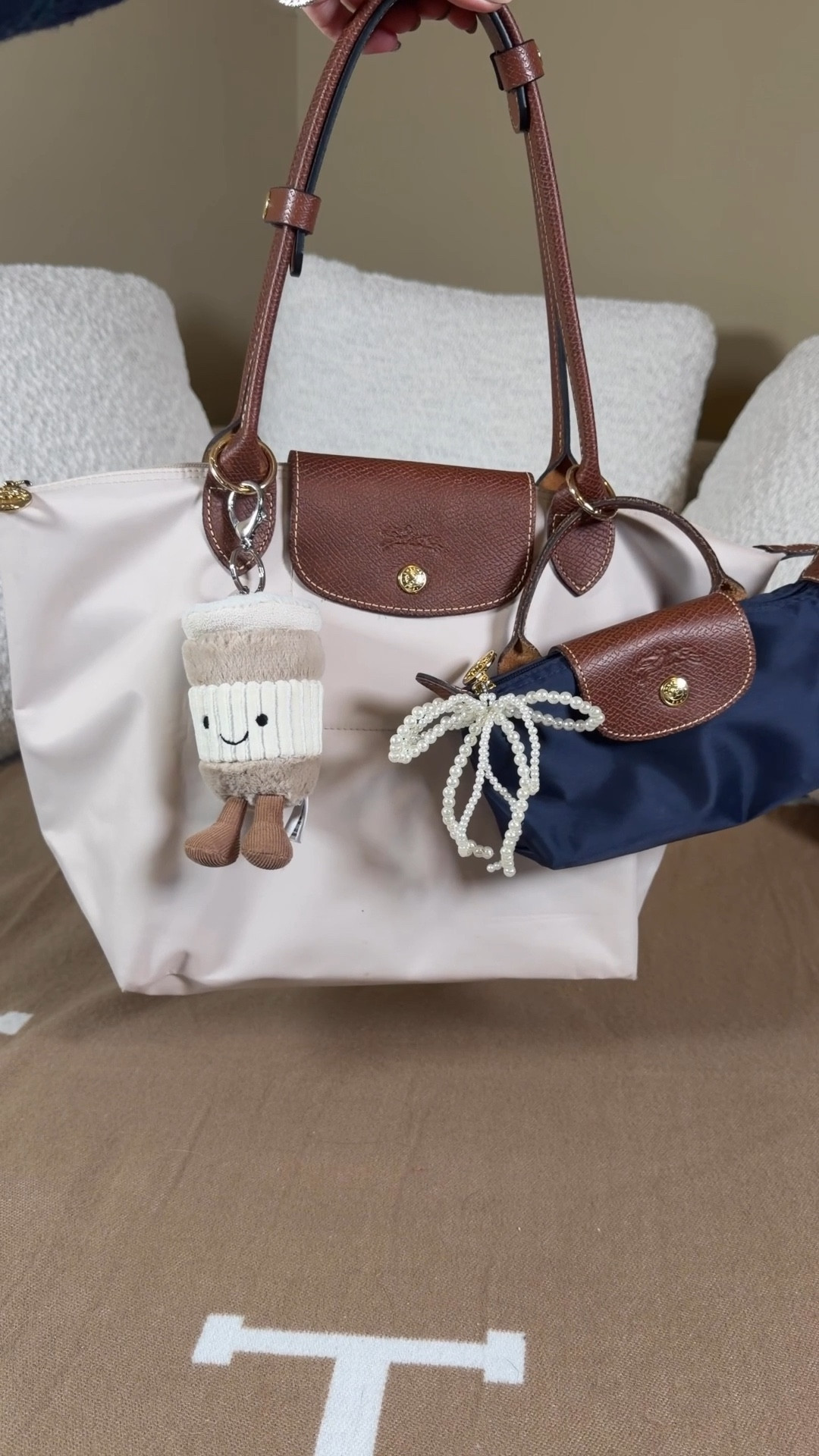 What’s better than one Longchamp Le Pliage? 2 Longchamo Le pliage! Doubled up Longchamp bags 😍 I saw this little hack of using a mini Longchamp pouch as a bag charm on a bigger Le Pliage tote and thought it was such a fun idea that also allows you to carry more! It also allows me to carry two of my favorite Longchamp sizes

What do you think of doubled up Longchamps?

#LTKootd #LTKdayinmylife