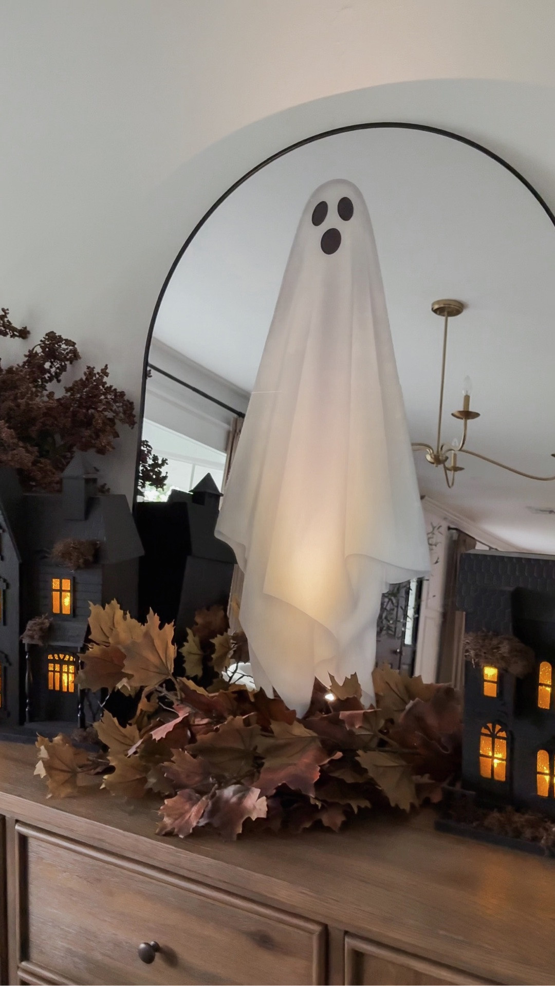 These ghost decals easily elevate your home for Halloween! Place on mirrors and glass, these decals will be a hit with guests. Add battery-operated lighting for a holographic effect. I also styled my sideboard with rustic pumpkins, and fall branches.

#LTKHome #LTKSaleAlert #LTKSeasonal