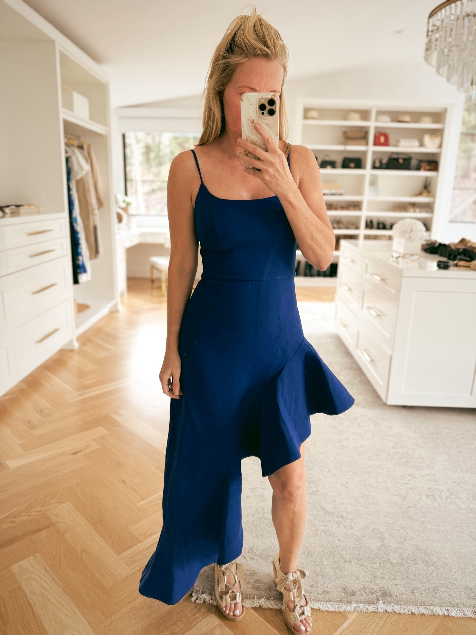Loving the asymmetrical hemline of this dress! This color is so gorgeous for any upcoming summer events. This dress is a homerun if you got a wedding invite. The fit and color really make this dress a standout. @Anthropologie  

#LTKWedding #LTKTravel #LTKOver40