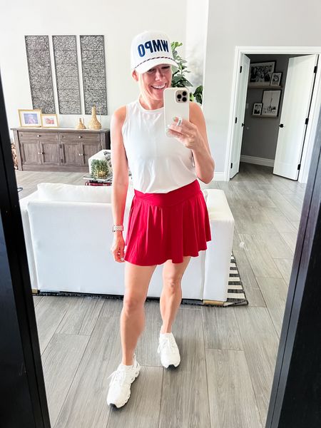 Love this red tennis skirt with On cloud sneakers and a white tank top. Small in everything 

#LTKOver40 #LTKActive #LTKFitness