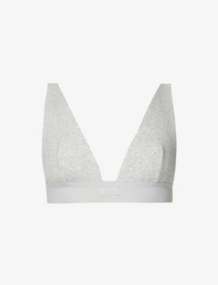 SKIMS Plunge brand-embroidered stretch-cotton bra | Selfridges