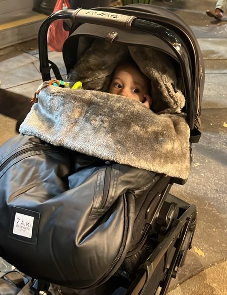 A winter must have! The 7AM Enfant infant pod which can be safely used in car seats and strollers to keep babies warm during winter temps! This was a must in NYC.  Tagged a few variations, and colors. My exact color combo is not available but the all black, tan and gray are available. 

#LTKfamily #LTKSeasonal #LTKbaby