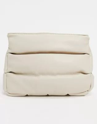 ASOS DESIGN clean clutch bag in off white quilted puff | ASOS (Global)