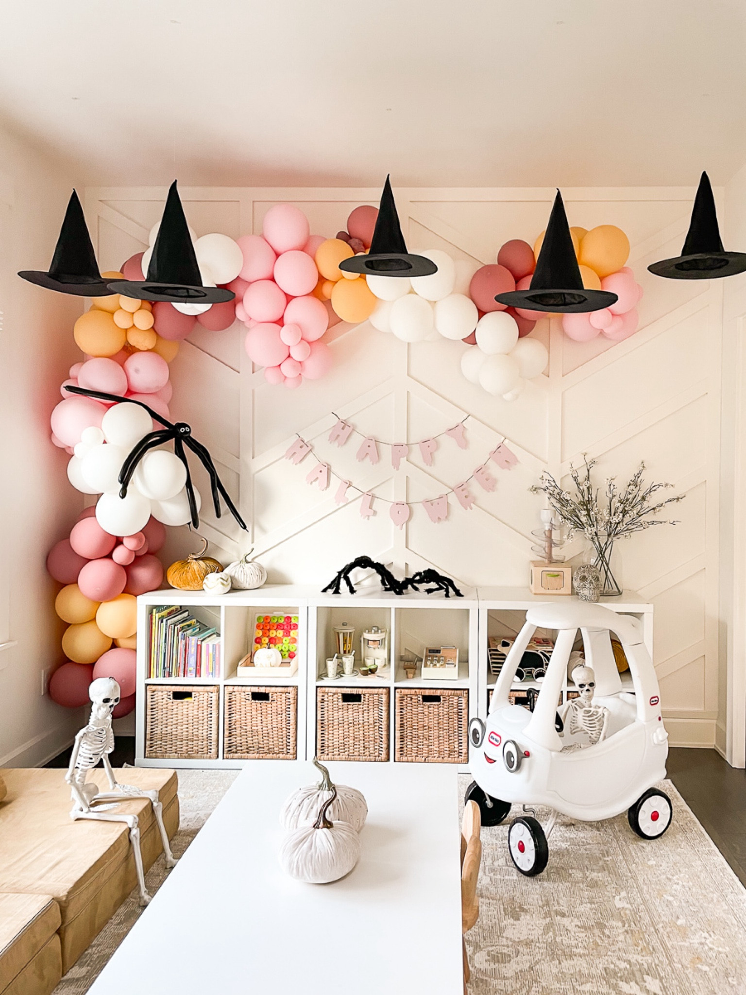 Halloween playroom for toddler, hanging witches hats, balloon garland, hair spiders, skeletons, Halloween decor, spooky decor for kids, toddler play table, playroom rug, playroom storage, fall decor


#LTKHalloween 

#LTKKids #LTKSeasonal #LTKHome