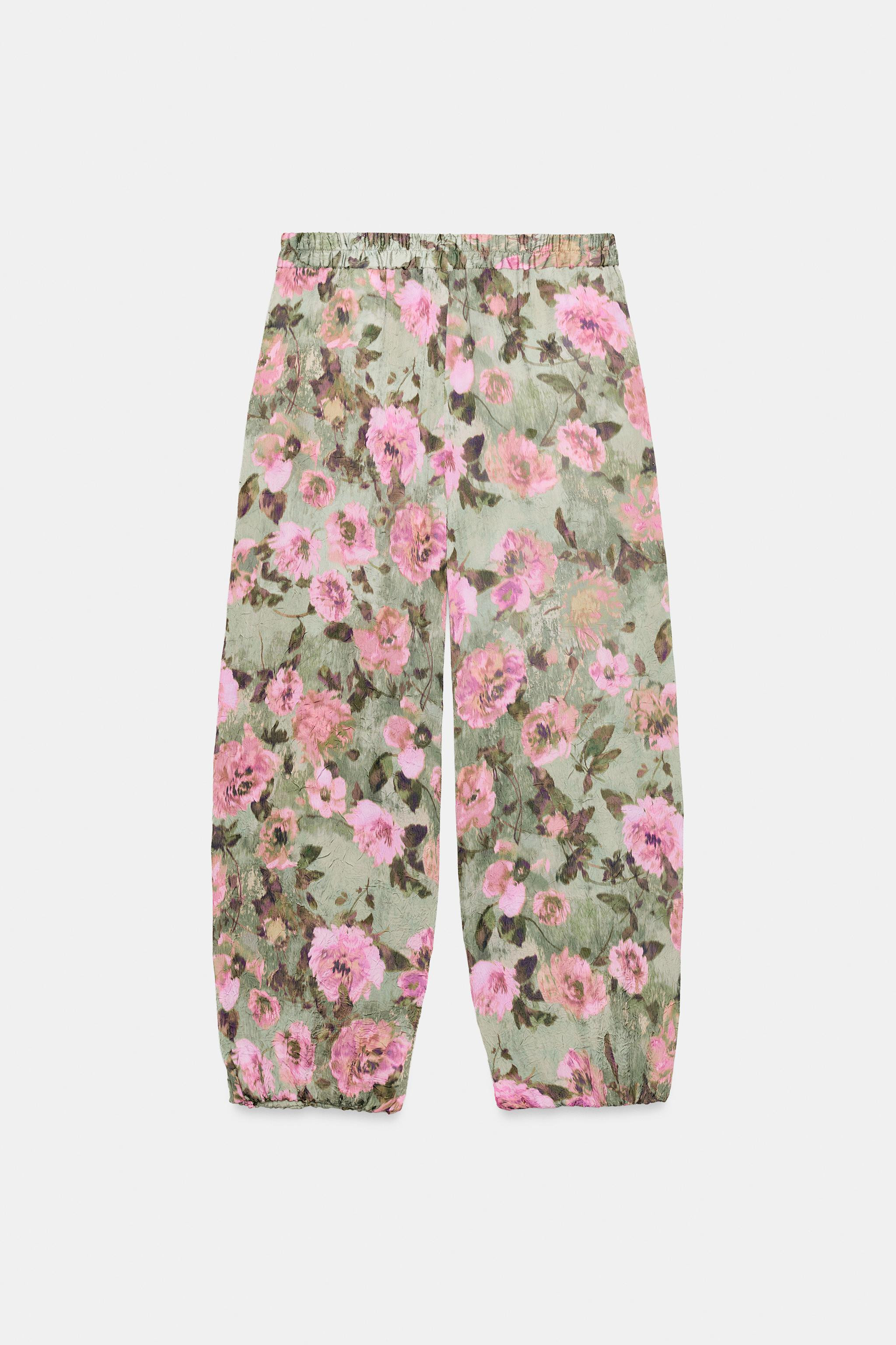 Crinkle-effect trousers. High-rise waist with an elasticated back and front darts. Front pockets.... | Zara US