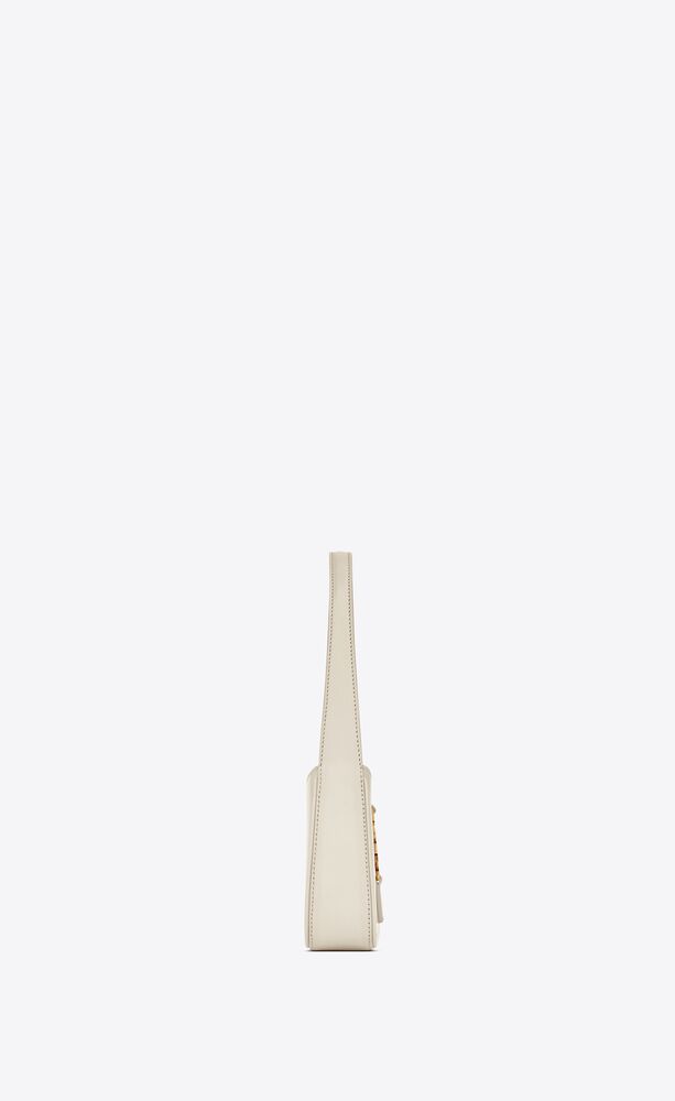 MINI HOBO BAG DECORATED WITH AN ICONIC YSL SIGNATURE HOOK CLOSURE. | Saint Laurent Inc. (Global)