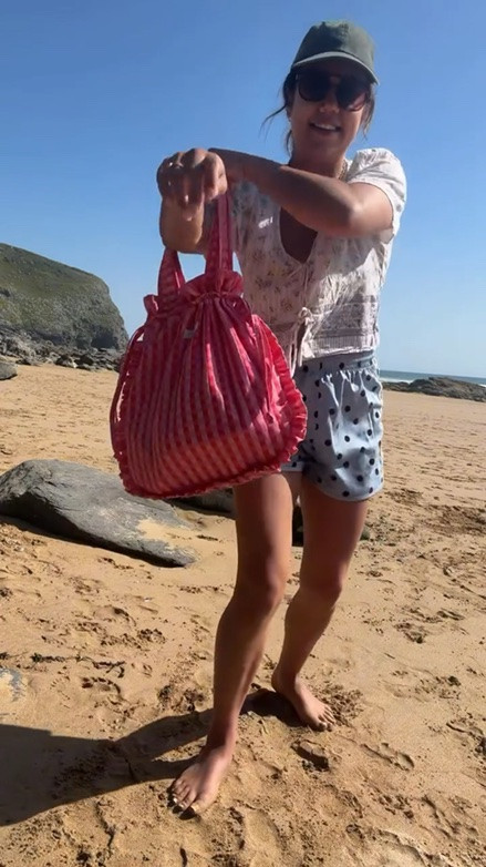 What a time to be on a Cornish beach, I know it’s a cliche but it’s honestly like being abroad. We’ve been to Cornwall and had all sorts of weather so believe me, we are making the most of it. How cute is this bag, I saw it in the shop window yesterday and it stopped me in my tracks!! I’ll tag what I can in my stories and add to my May highlights for you 🫶🏽. I hope you’re enjoying the bank holiday sun. 🌞 
.
.
.
UK heatwave outfit ☀️ what I wore beach day, beach outfit ideas UK, mum style UK, mum of 3 outfit, summer outfit inspo, colourful outfit ideas, beach day outfit, UK beach day, British summer style, holiday outfit ideas, real mum style, everyday outfit inspo, affordable fashion UK, rewearing outfits, summer fashion UK, beach with kids, family beach day, coastal day out UK, practical mum outfits, hot weather outfits, UK staycation style, summer mum fashion, outfit inspiration UK, beachwear outfit inspo, day at the beach UK, Cornwall style, seaside outfit ideas, family lifestyle UK, fashion over 30, mum fashion creator, OOTD UK, UK fashion blogger, summer wardrobe ideas, beach day with kids, UK travel and lifestyle, colourful fashion, easy summer outfits, casual chic outfit, heatwave outfit ideas
