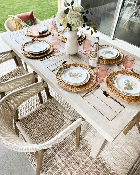 Outdoor dining table and dinnerware, outdoor chairs and rug, acrylic ribbed cups, lanterns, hanging planters 

#LTKhome #LTKSeasonal #LTKparties