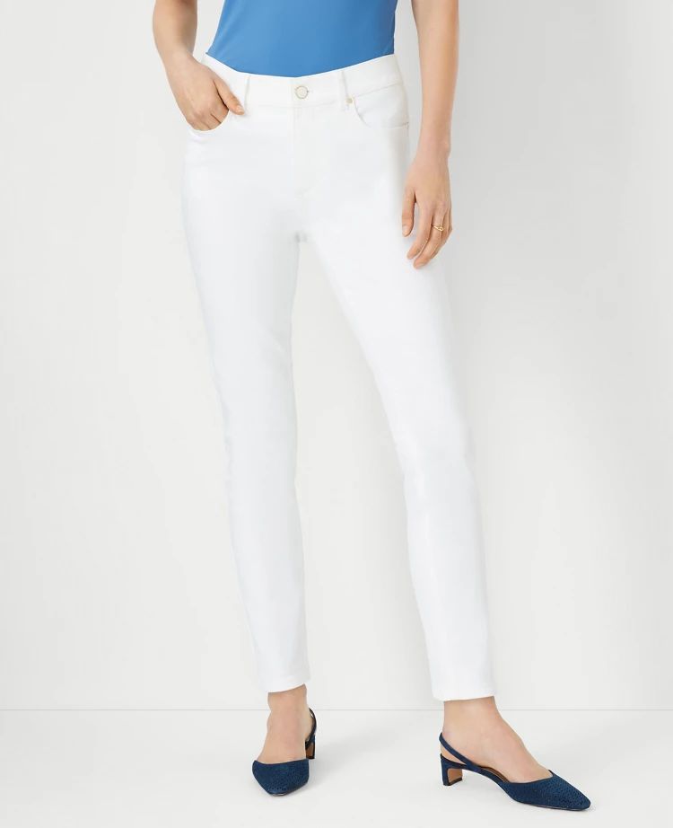 Sculpting Pocket Mid Rise Skinny Jeans in White | Ann Taylor (US)