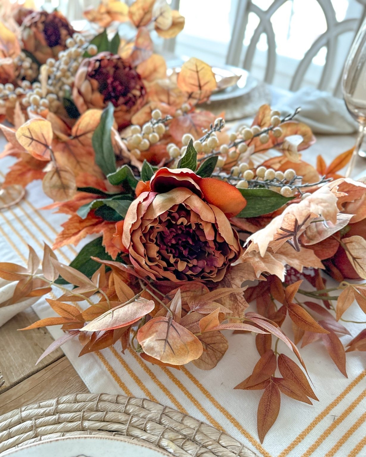 Sharing a closeup of the details on my fall centerpiece from my tablescapes! To add depth and texture, I used ivory berries and rust-colored peonies, which provide a beautiful contrast against the rich foliage.

#LTKSeasonal #LTKHome #LTKFindsUnder50