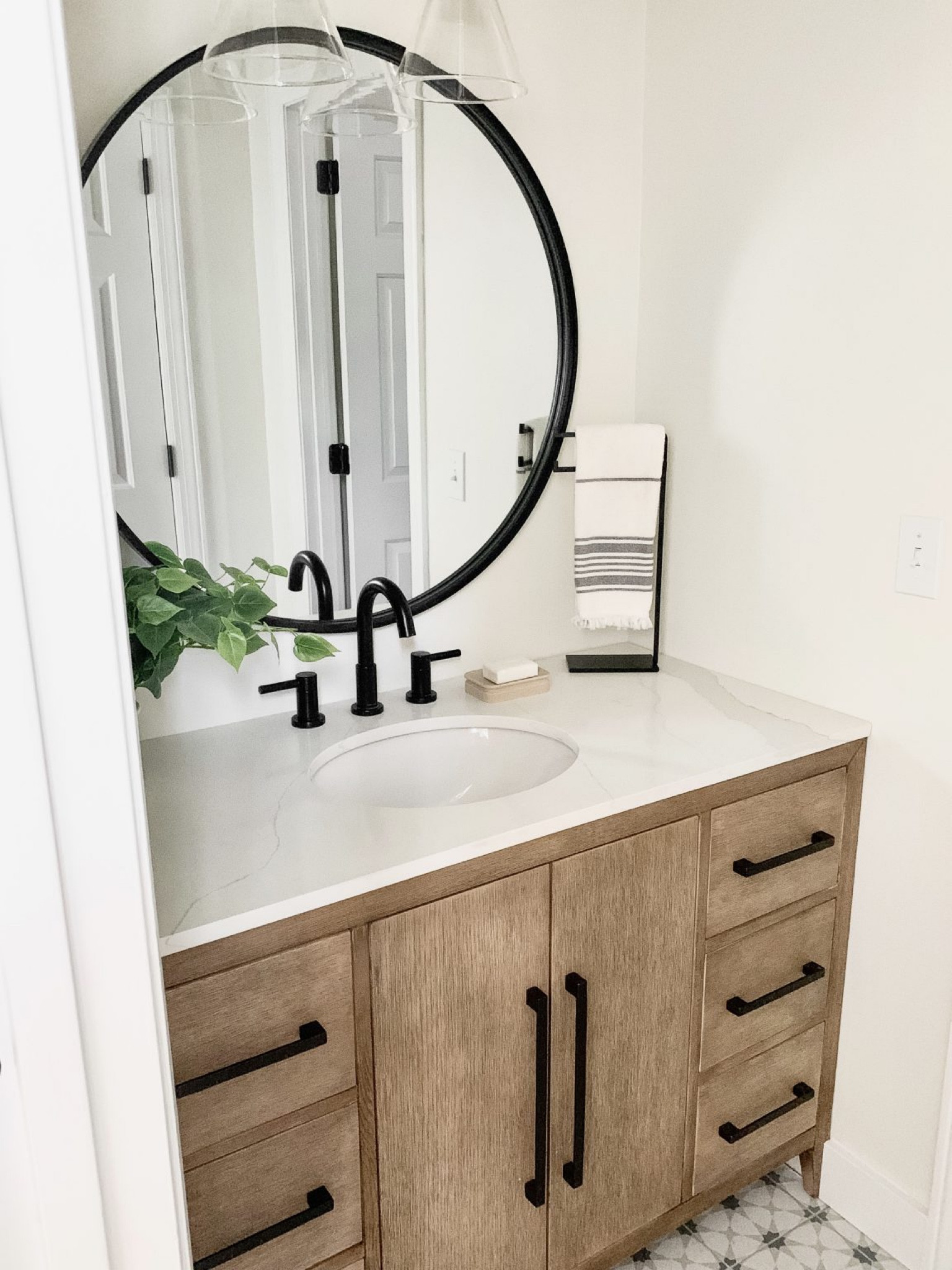 Bathroom vanity. Jack and Jill bathroom. Wood vanity. Black round mirror. Kid’s bathroom vanity. Wood vanity with black accents. 

#LTKFind #LTKhome