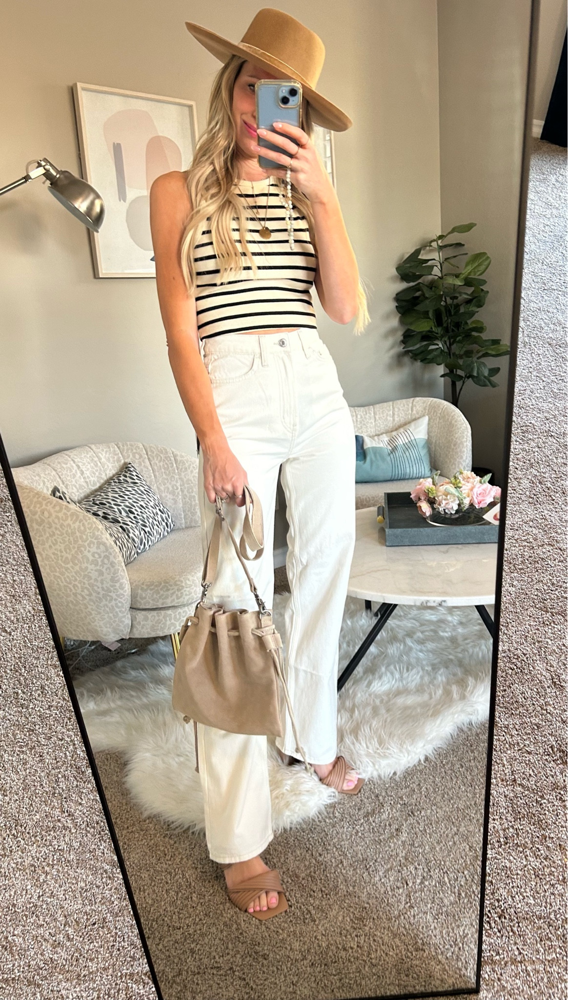 This top literally goes with everything! And these jeans are the perfect white jeans for spring and summer! This whole look is so affordable! Would you believe this top and jeans together are $40!!! 

#LTKtravel #LTKfindsunder50 #LTKstyletip