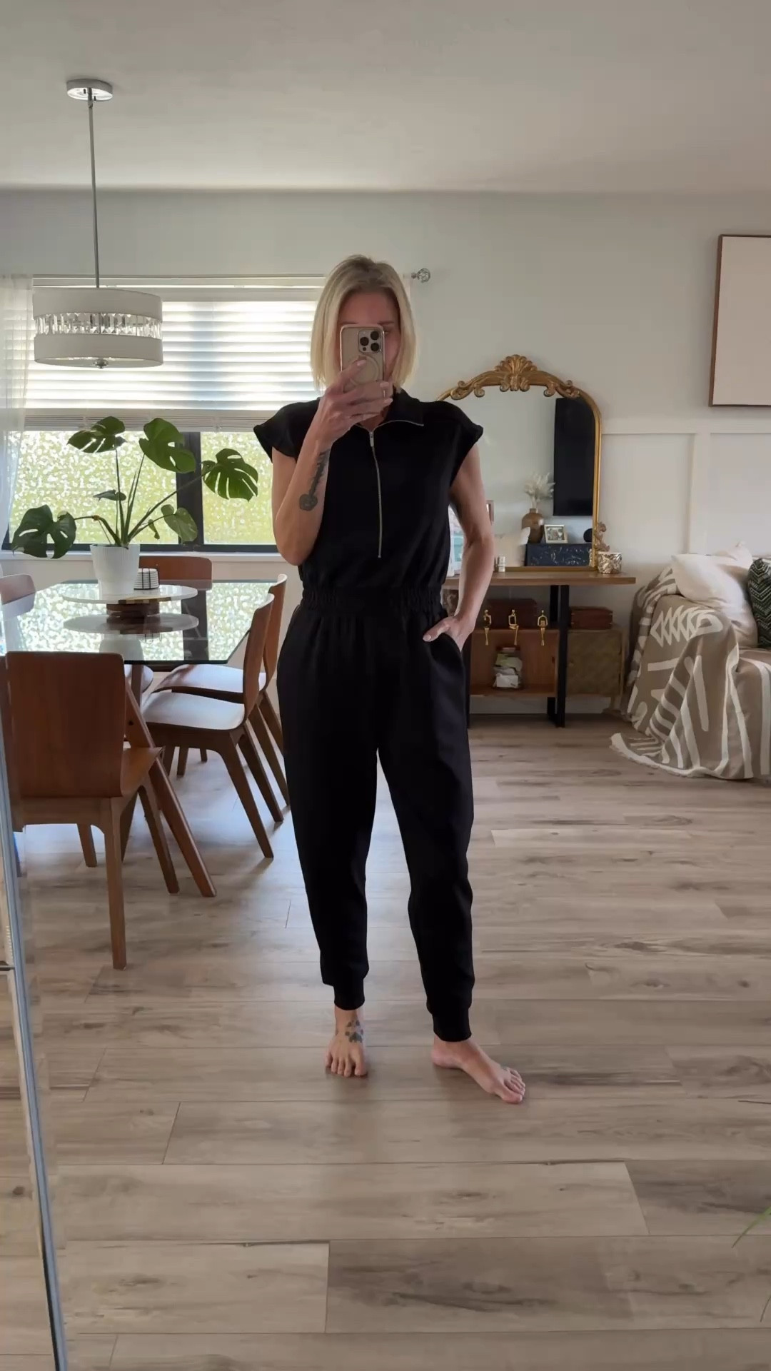 This Scoop Jumpsuit is perfection. It’s made of the scuba knit material that Scoop is known for. The cinched in waist gives you a nice shape and makes it look for tailored. I would size down one, I’m wearing an XS. It’s available in black and a taupe color. 

#LTKSeasonal #LTKootd #LTKOver40