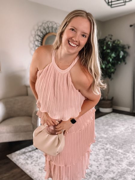 Pink midi tiered wedding guest dress. Formal enough for black tie optional and casual enough for a bridal shower. This light pink is adorable but it comes in a bunch of colors! My bag is a MUST BUY from Amazon’s The Drop, I’ve brought it to a few events already and it’s perfect.

#LTKwedding #LTKitbag #LTKcurves
