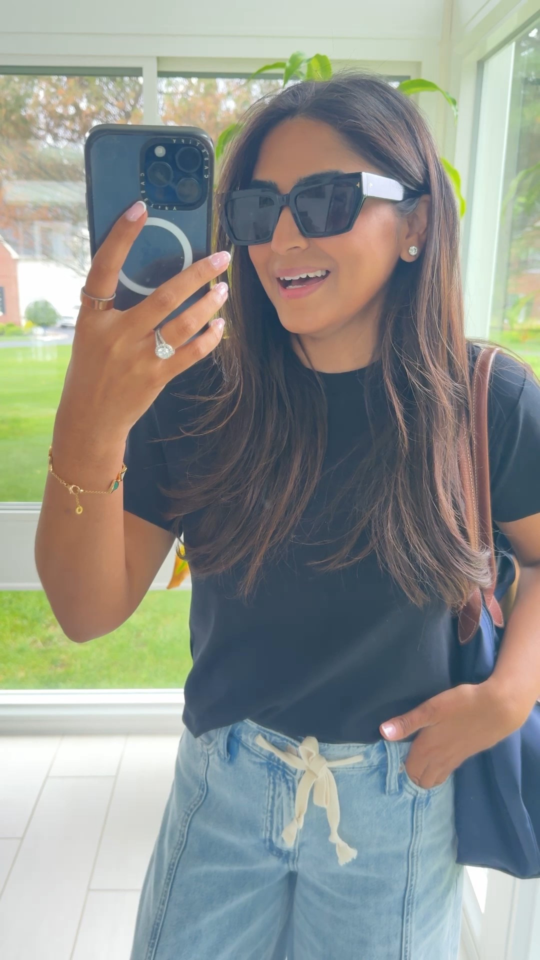 Wearing XS in the t shirt. 

I’m usually 26 in jeans but sized down to 24 in these. Regular length. 

Love the sunnies and the tote !

Easy summer chic look for busy moms !!