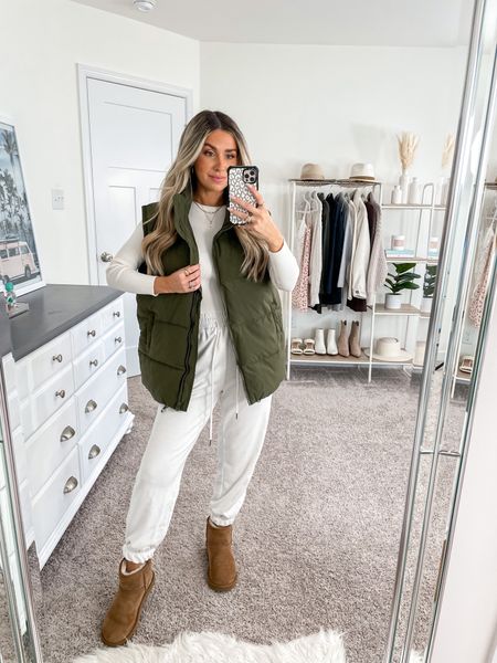 Ten ways to style this green puffer vest from Amazon 🫶🏼 look 2/10! 
+ puffer vest: small
+ top: s/m
+ sweatpants: small
+ ugg minis: true to size 

#LTKfindsunder50 #LTKSeasonal #LTKfindsunder100