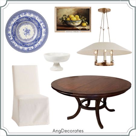 Transitional Dining Space



Blue and white plates slipcovered chair round table marble bowl lemon art

#LTKhome