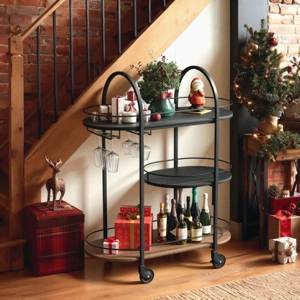 Invite guests for holiday happy hours with the festive Arc Bar Cart. This bar cart is under $100,

Keywords: Bar cart, living room, holiday party, black bar cart, gold bar cart, holiday decor



#LTKHoliday #LTKSaleAlert #LTKHome