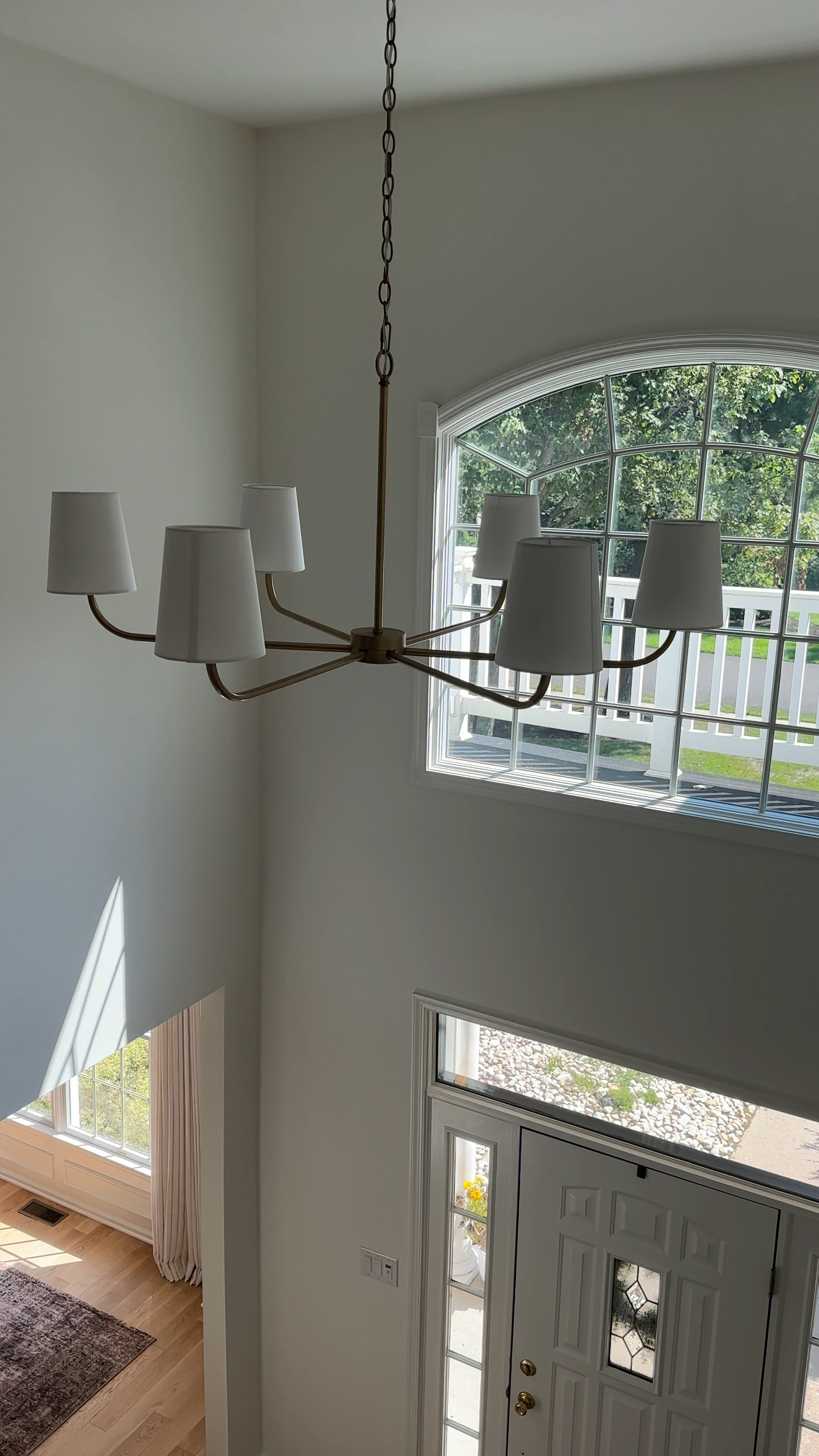 Westchsse Chandelier in Aged Brass in Entryway 

#LTKVideo #LTKHome