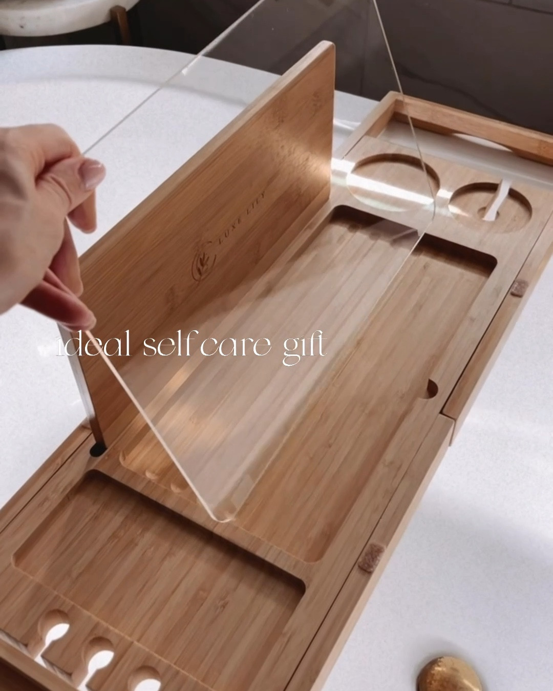 ✨ Treat yourself or someone you love to the ultimate self-care upgrade! This one-of-a-kind bath tray with a water shield for your book is a game changer for relaxing nights. 🛁📖 Plus, it’s currently on sale—the perfect excuse to grab one for yourself and gift another! Linked below 👇🏻 
 #LTKhome #SelfCareGift #AmazonFinds #GiftGuide

#LTKCyberWeek #LTKSaleAlert #LTKGiftGuide