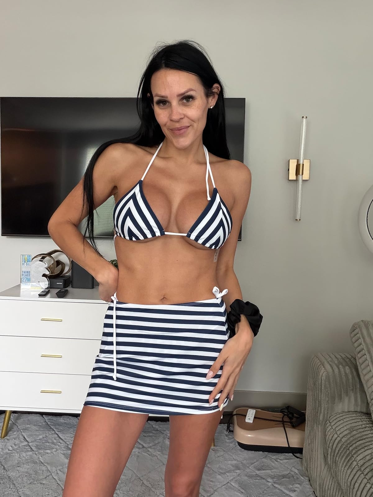 Sail into summer with this classic navy and white striped bikini and matching mini skirt set. The perfect nautical-inspired look for your next boat day or beach getaway! Click the link in my bio to shop this look! #NauticalStyle #SummerBikini #VacationReady 

 #LTKdayinmylife #LTKgrwm #LTKootd