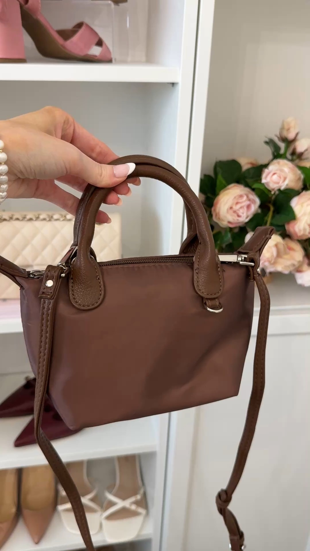 Walmart $10 designer look for less bag! Looks like the Longchamp mini le pliage crossbody! 🤎 

#LTKSaleAlert #LTKFindsUnder50 #LTKSeasonal