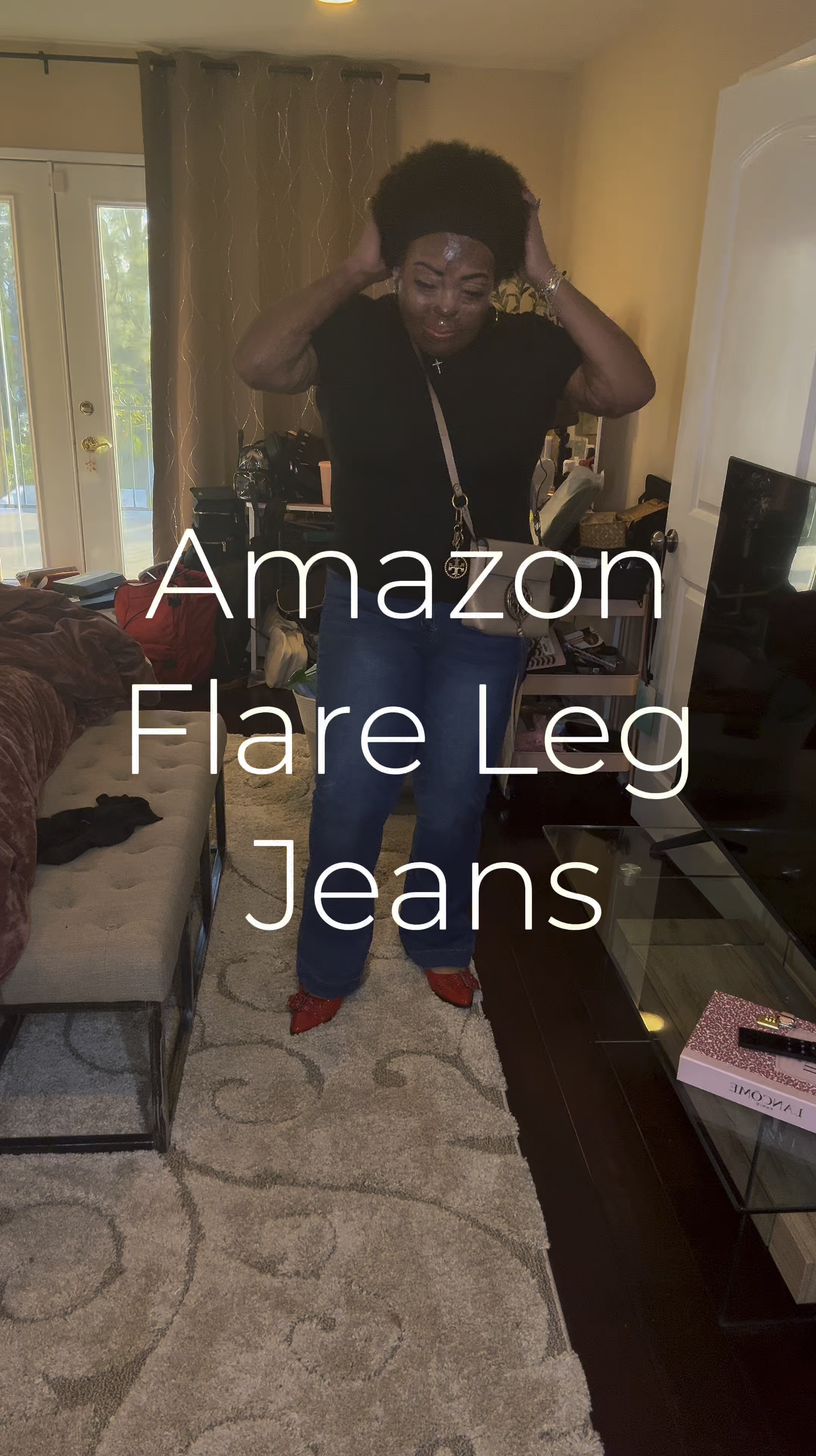 Kunmi flare leg jeans, a fitted baby tee and Steve Madden slingbacks all from Amazon! The jeans and the shoes are true to size. The baby teeis a lot more comfortable if he size up.
God, I’m hurting. I don’t know if I can do it.
My bag is an old Tory Burch that I just love!

I decided to wear my fro today.🦋

bell bottoms, flares, Kendrick Lamar jeans, 90s fashion, 70s fashion

#LTKPlusSize #LTKOver40 #LTKMidsize