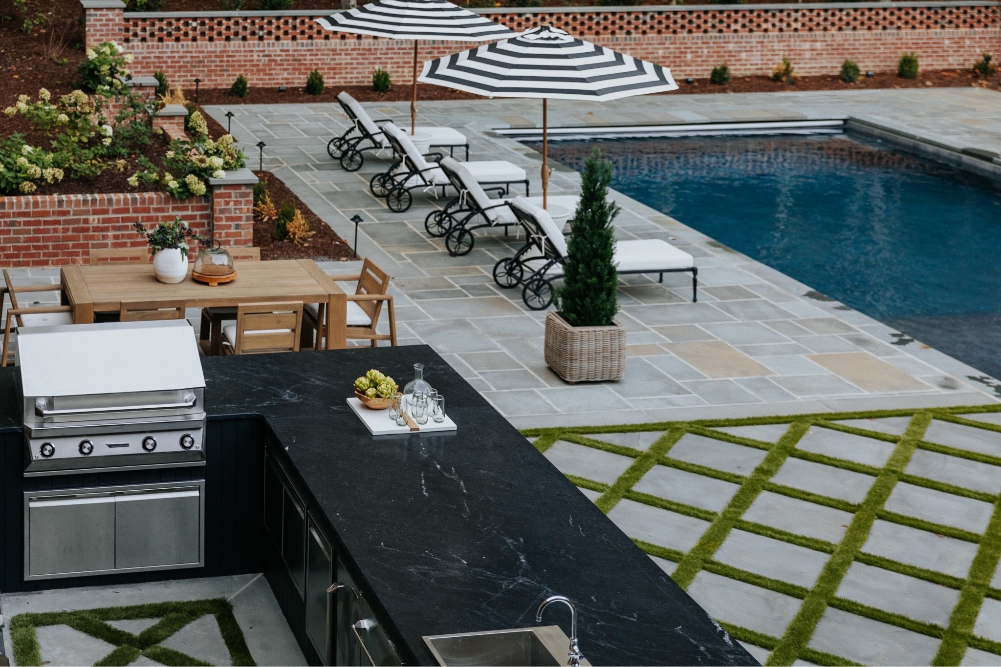 Our backyard is coming along!

Pool Chaise, Umbrella, Woven Planter, Outdoor Table, Outdoor Furniture 

#LTKhome