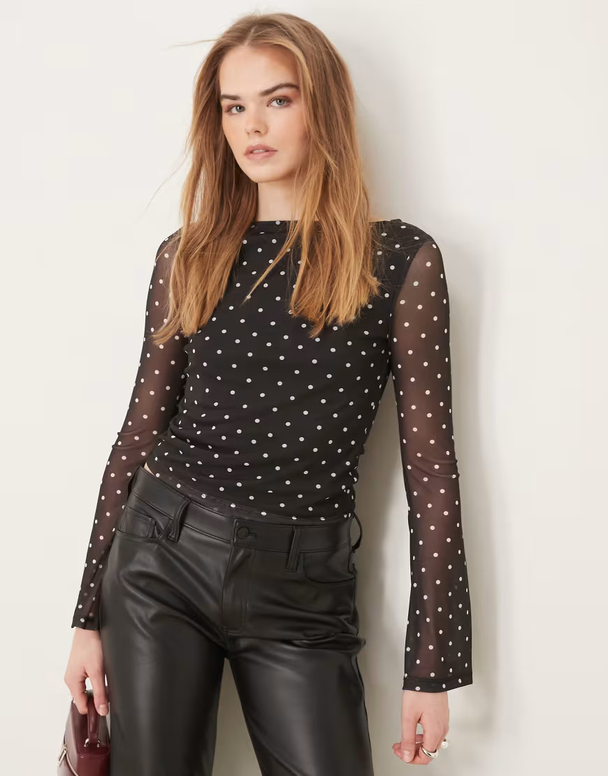 ASOS DESIGN polka dot sheer mesh angel sleeve top in black | ASOS (Global)
