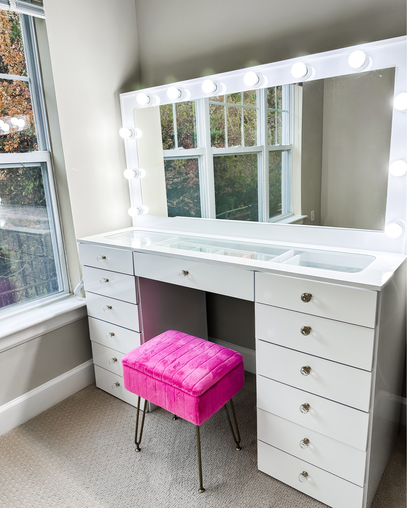 Makeup vanity and velvet stool set up for content creation. I love the extra large makeup mirror with the lights. There is SO much storage. The plug in on the side is a huge bonus also. #makeupvanity #vanity #makeuproutine #imjustagirl

#LTKGiftGuide #LTKBeauty #LTKHome