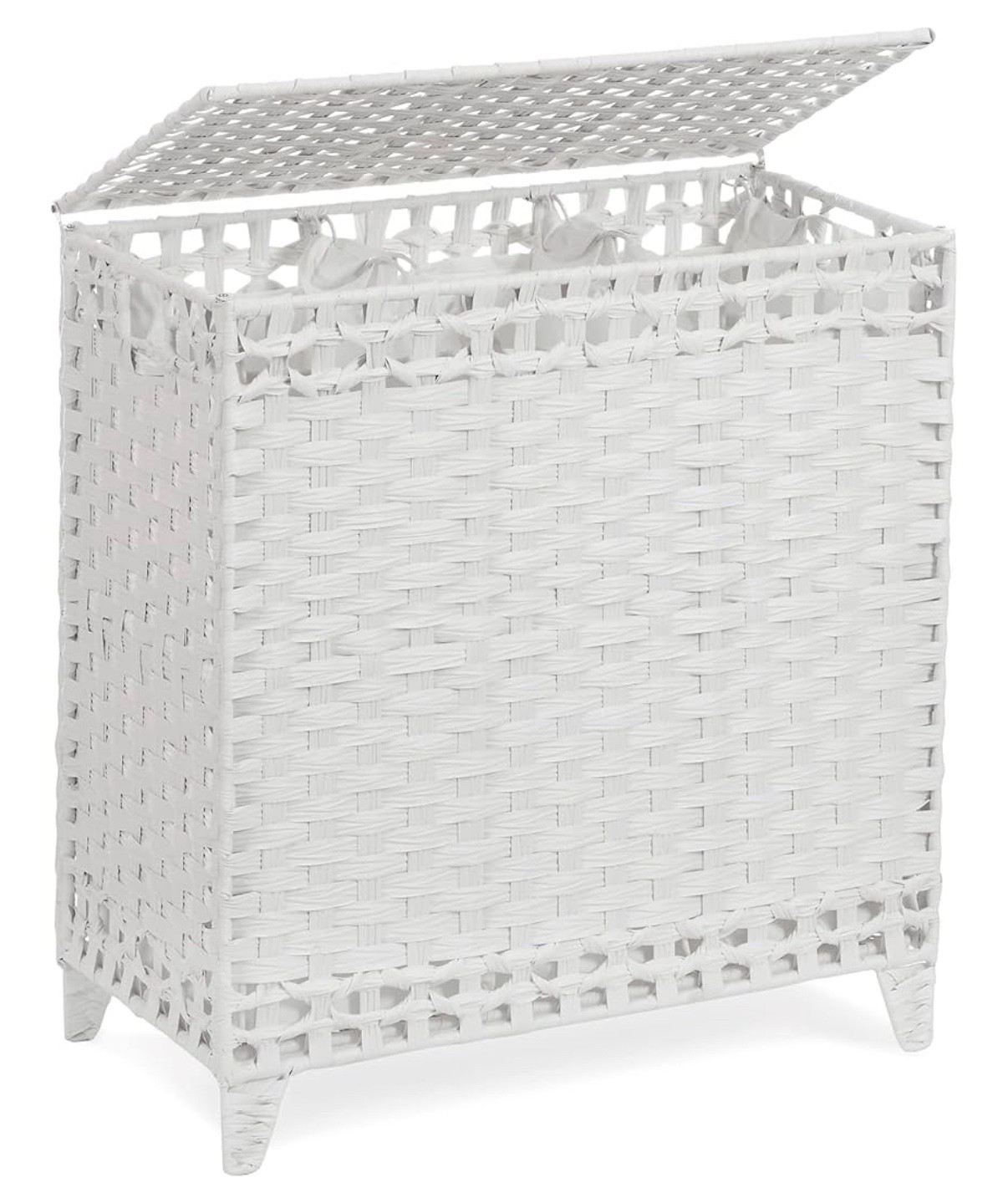 Elevating my bedroom with this 3-compartment, handwoven rattan laundry basket with lid. 