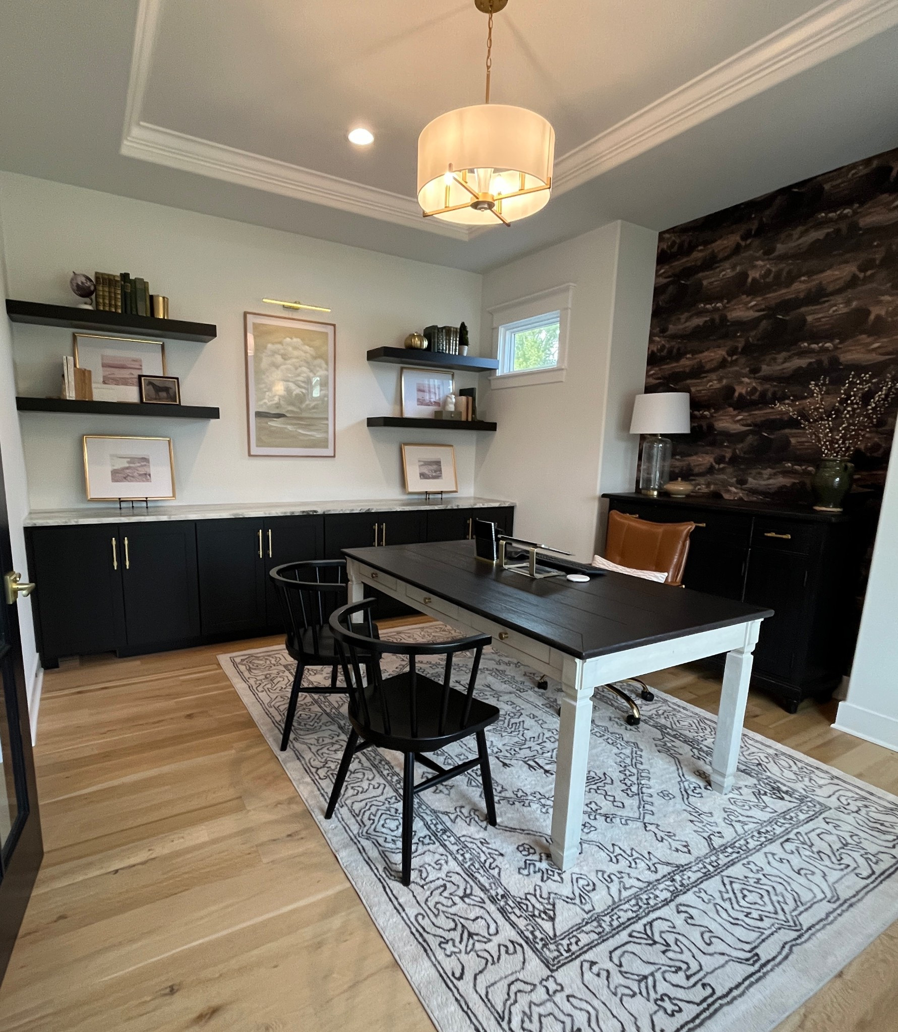 Home office transformation complete 🖤 From a blank canvas to a curated space featuring custom built-ins, granite countertops, and statement moody wallpaper. Every detail was designed with both function and style in mind—and I couldn’t be happier with how it all came together. Which detail is your favorite?

#LTKHome #LTKWorkwear #LTKFamily