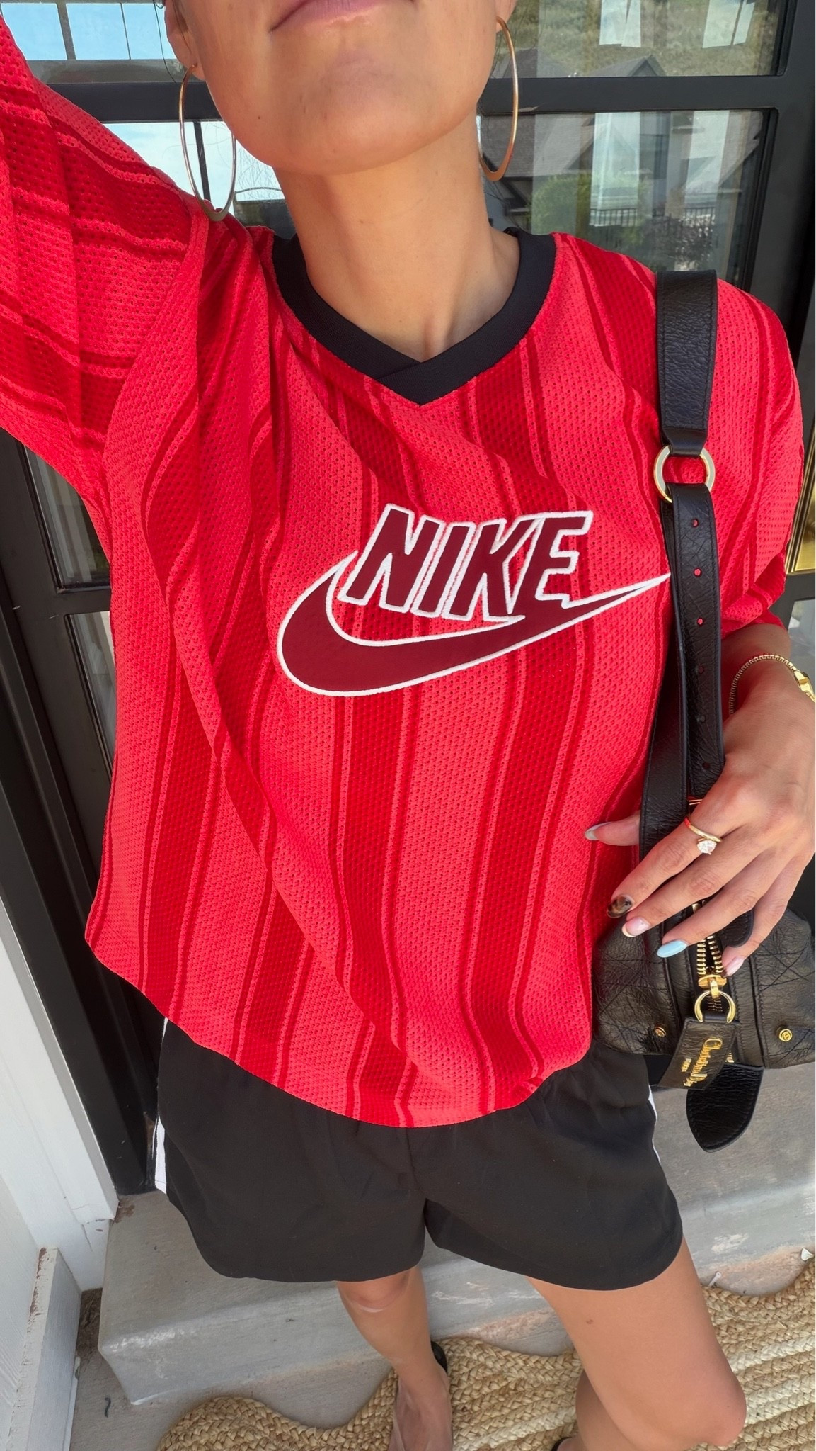 Casual every day outfit 〰️

Red top from @Nike US 
Track Shorts & ring from @amazon

#LTKootd #LTKActive #LTKOver40