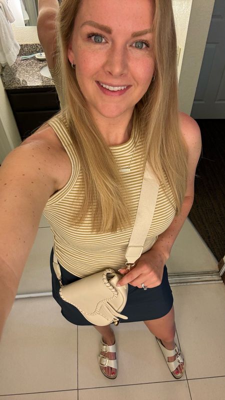 What I wore today - hot summers day outfit for Arizona

High neck striped tank with navy high waisted exercise skort (they have a built in shorts & phone pocket)

Paired with beige crossbody bag and Birkenstock sandals

#LTKFindsUnder50 #LTKSaleAlert #LTKSeasonal