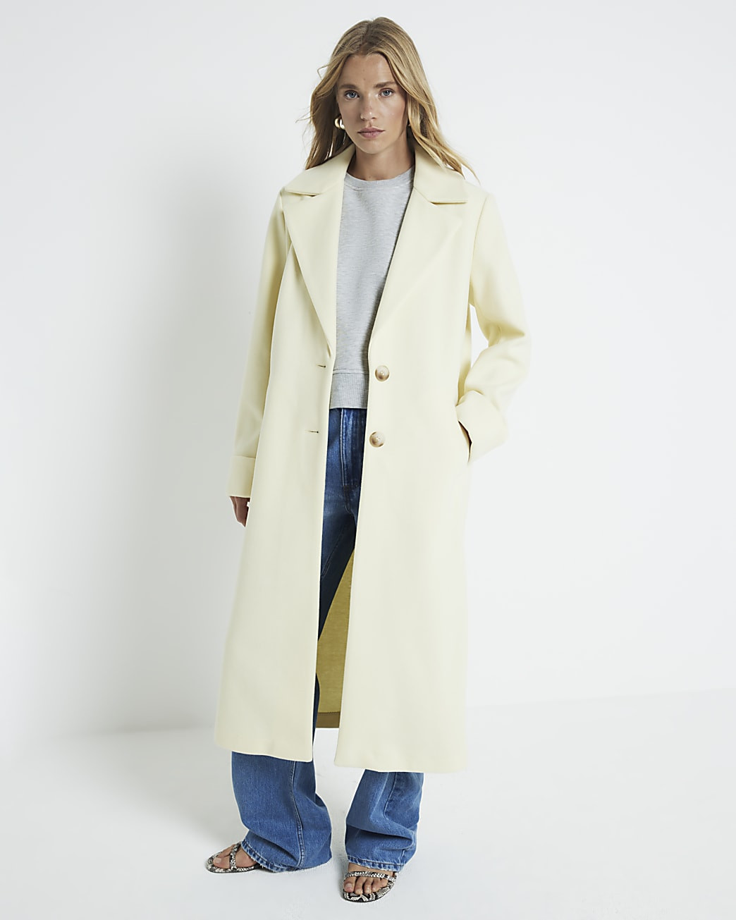 Yellow button up longline coat | River Island (UK & IE)