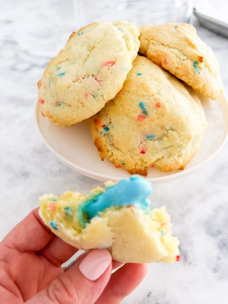 Let me just say… these cookies are magically delicious ✨🍀 and so simple!

All you need is 1 box of Funfetti Cake Mix (Spring Version), 2 eggs, 1/2 cup oil and 1 cup of Lucky Charms Marshmallows (fluffy cookies ones).

Mix the first 3 ingredients to make your cookie dough. Then place 1 cookie scoop (2 tablespoons) onto parchment paper. Place 1 marshmallow in the center of each cookie dough scoop, followed by adding another cookie scoop of cookie dough on top. With a clean finger, seal the edges! 
Bake at 350 for 10-12 minutes or until the edges are light brown. 

#LTKfamily #LTKhome #LTKSeasonal