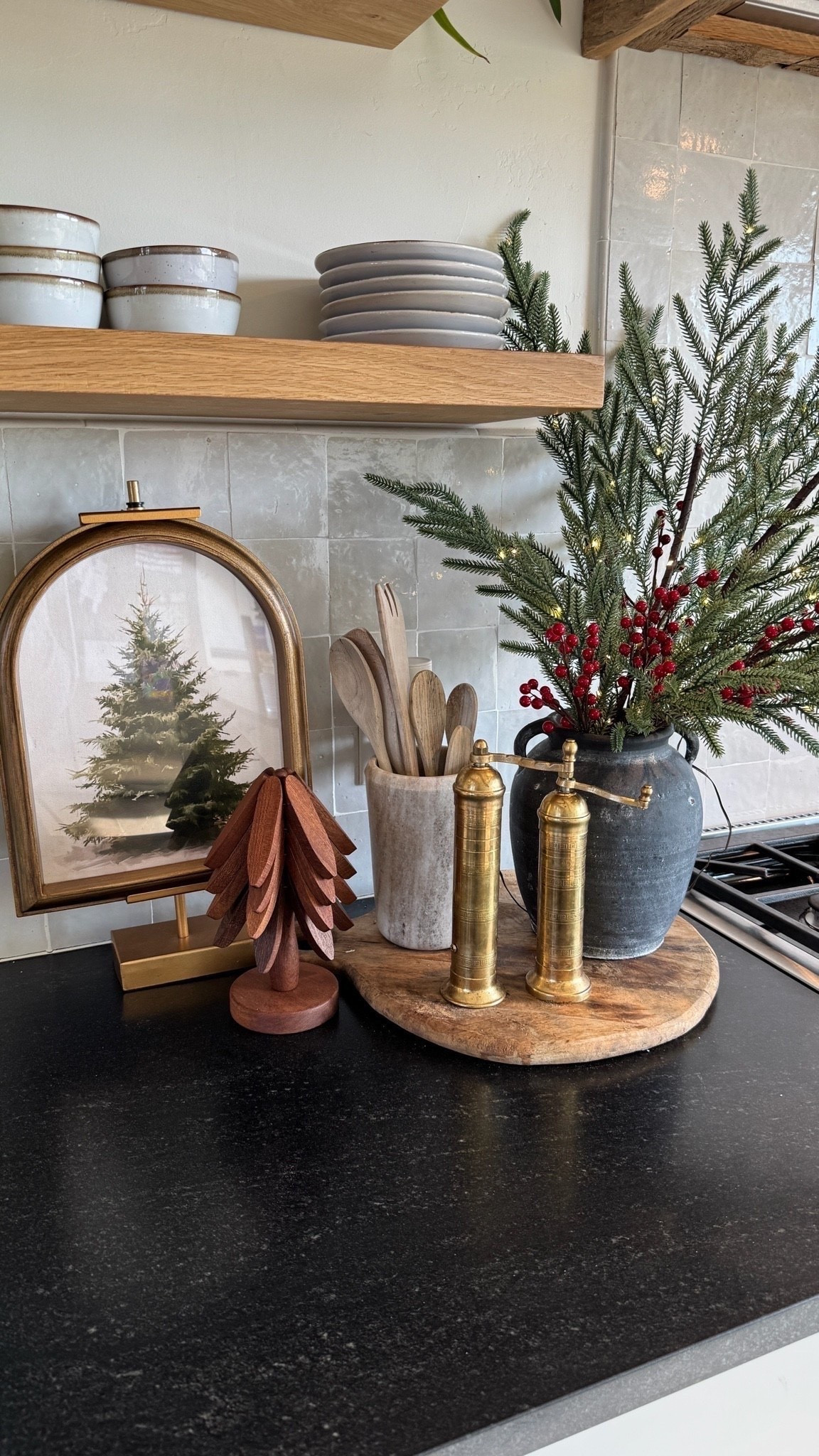 A little Christmas magic in the kitchen. 🎄🤎

You really don’t need to go all out to make your kitchen feel festive. A touch of greenery, a seasonal towel, a tiny village display, or a few classic Christmas accents can instantly bring in that cozy holiday feeling.

I love keeping holiday decor simple enough that the kitchen still feels functional, but adding just enough warmth and charm to make everyday moments feel a little more special.

Sometimes the smallest festive touches are the ones that make a home feel the coziest. ✨

#LTKHome #LTKSeasonal #LTKmomlife