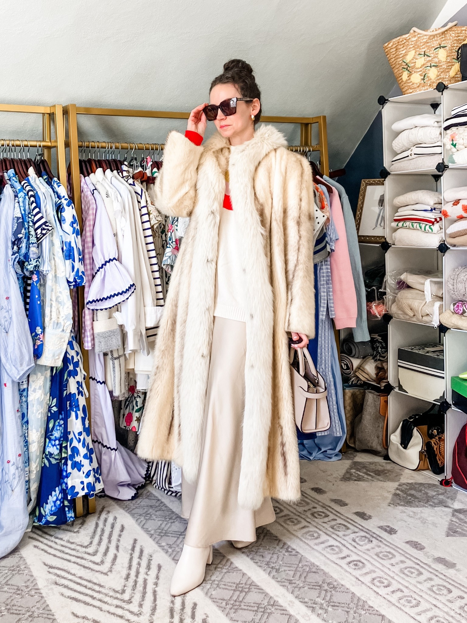 A spring outfit when it still feels like winter!
Cashmere sweater is old from Biden, linking similar. 
Cream satin maxi skirt from Amazon. 
Fur coat is vintage, linking similar. 
Tortoiseshell sunglasses from Burberry. 
Gold and white topaz earrings from Peachmind. 
White booties are old from Blondo, linking similar. 
Petite outfit. Modest outfit. Neutral outfit. Winter outfit. Spring outfit  

#LTKgrwm #LTKmomlife #LTKootd