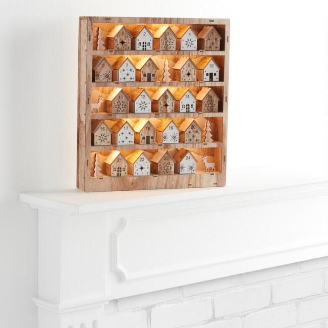 Woodcut Snowy Houses LED Light Up Countdown Calendar | World Market