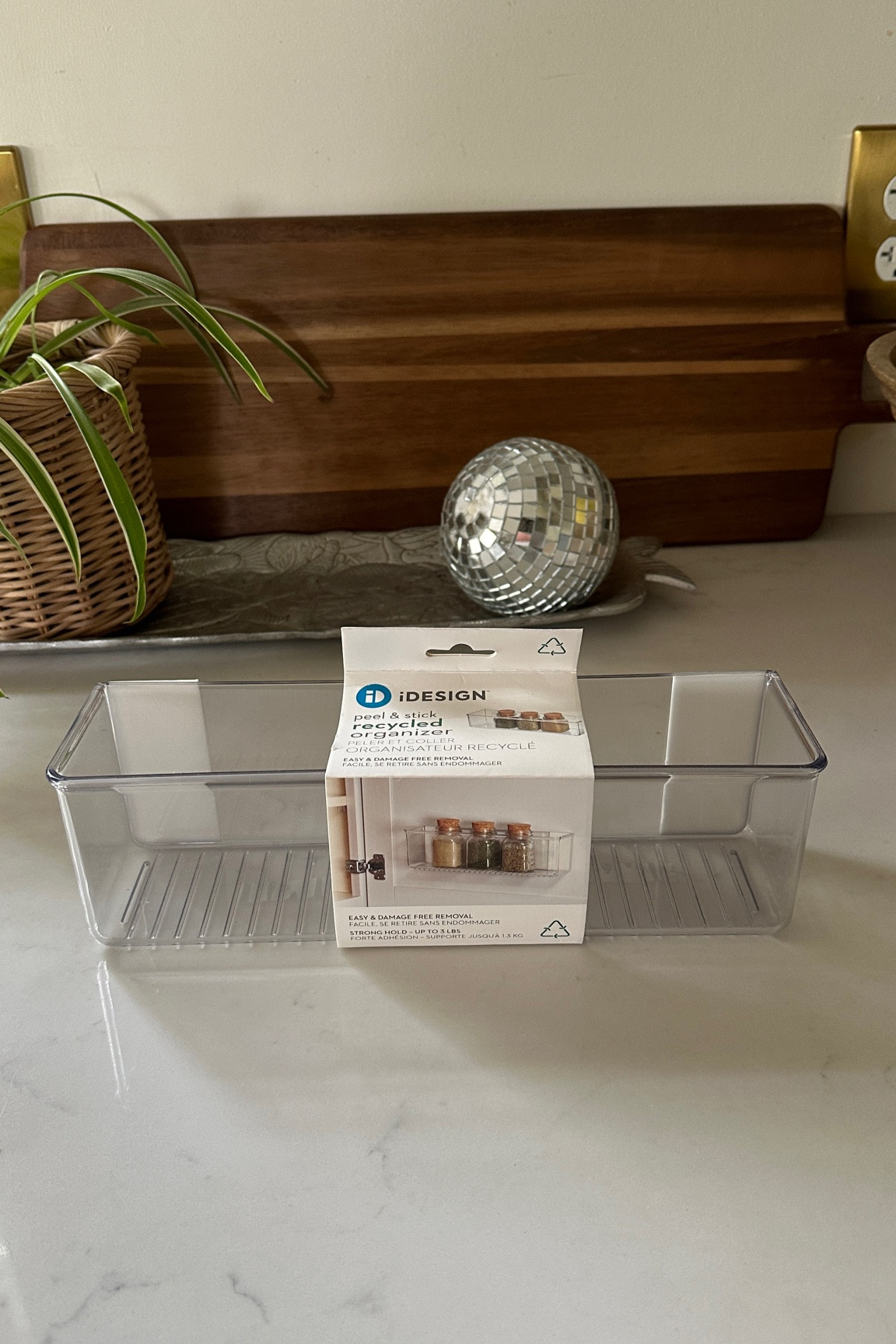 Small space storage hack for organizing spices, Tupperware, lids, beauty, tools, hair tools, and more! 
This is a self adhesive container.

Home hack
Small space hack
Storage
Organization
Tupperware storage
Lid storage 
Small house 
Small apartment 


#LTKhome #LTKkids #LTKfamily