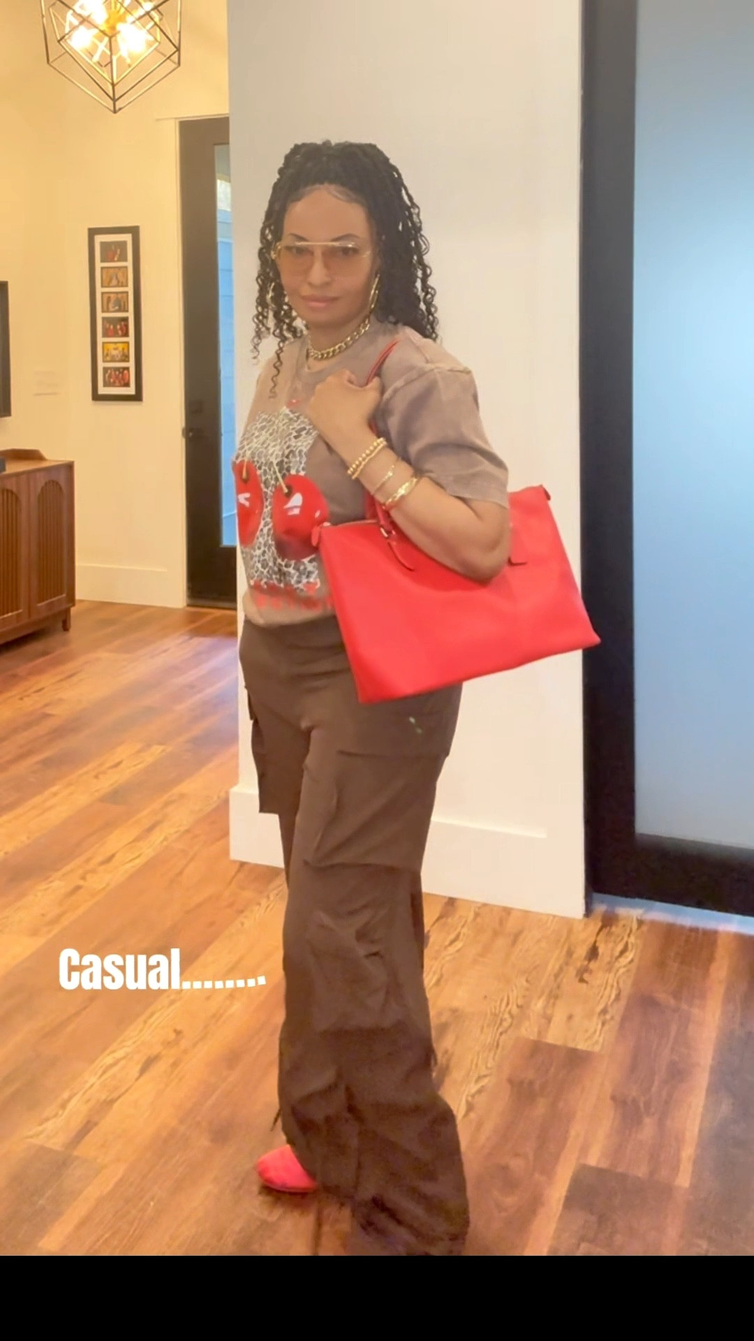 Elevated casual look 🤎❤️
Cargo pants + graphic tee + statement bag = effortless polish
Shop the look…….linked ✨
#springfashion #OOTD #cargopants #graphictee 

#LTKOver40 #LTKootd #LTKBeauty