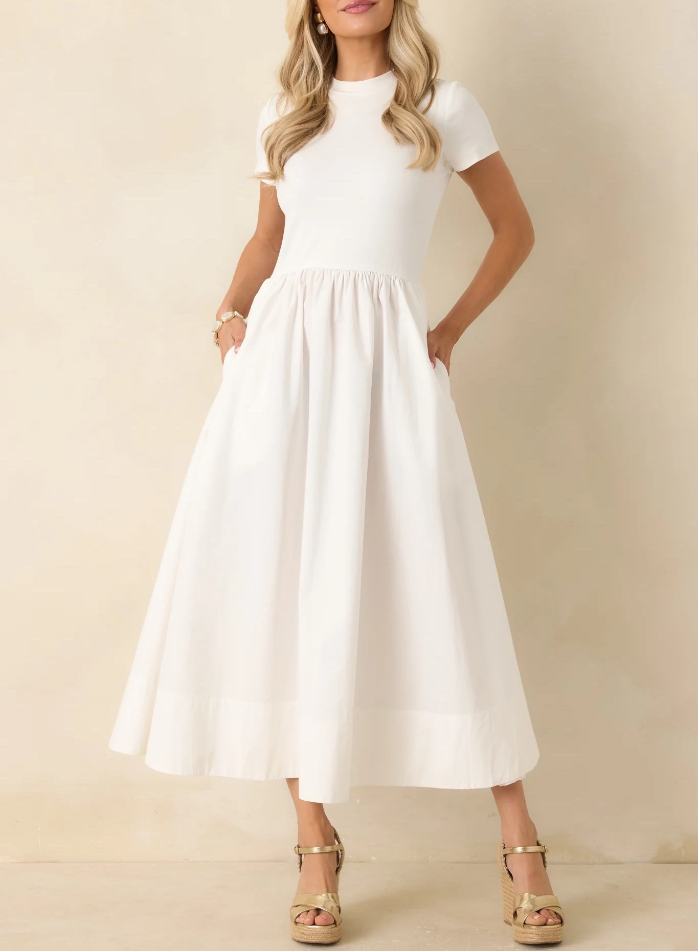 This white cotton short sleeve midi dress combines breathable comfort with a clean, feminine silhouette, creating the perfect piece for brunches, vacations, and elevated everyday summer styling. Under $150.

Keywords: 

* white cotton midi dress
* short sleeve midi dress
* summer midi dress
* feminine white dress
* casual elegant dress
* breathable summer dress
* minimalist midi dress
* everyday summer dress
* European summer outfit
* brunch outfit inspiration
* vacation wardrobe staple
* warm weather fashion
* resort casual style
* café style outfit
* elevated everyday dress
* travel friendly outfit

#LTKgrwm #LTKootd #LTKTravel