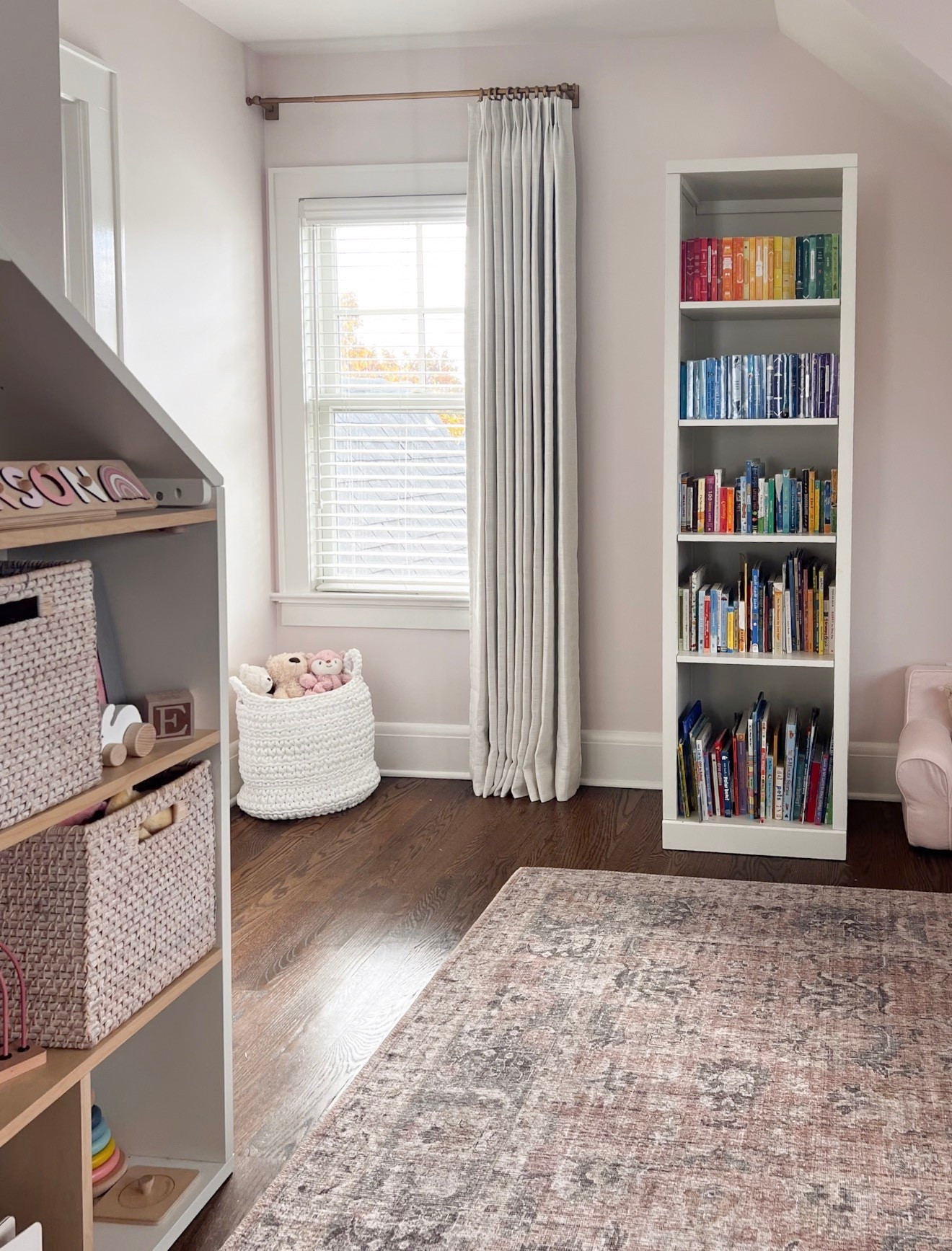 A cute corner of a little girl’s bedroom that I designed 🩶 

A pretty low-maintenance rug, my go-to custom curtains, the cutest house bookcase and a statement chandelier! 

#LTKBaby #LTKKids #LTKHome