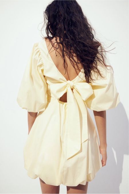 Yellow bow back puff sleeve dress 

#LTKstyletip #LTKfindsunder50 #LTKSeasonal