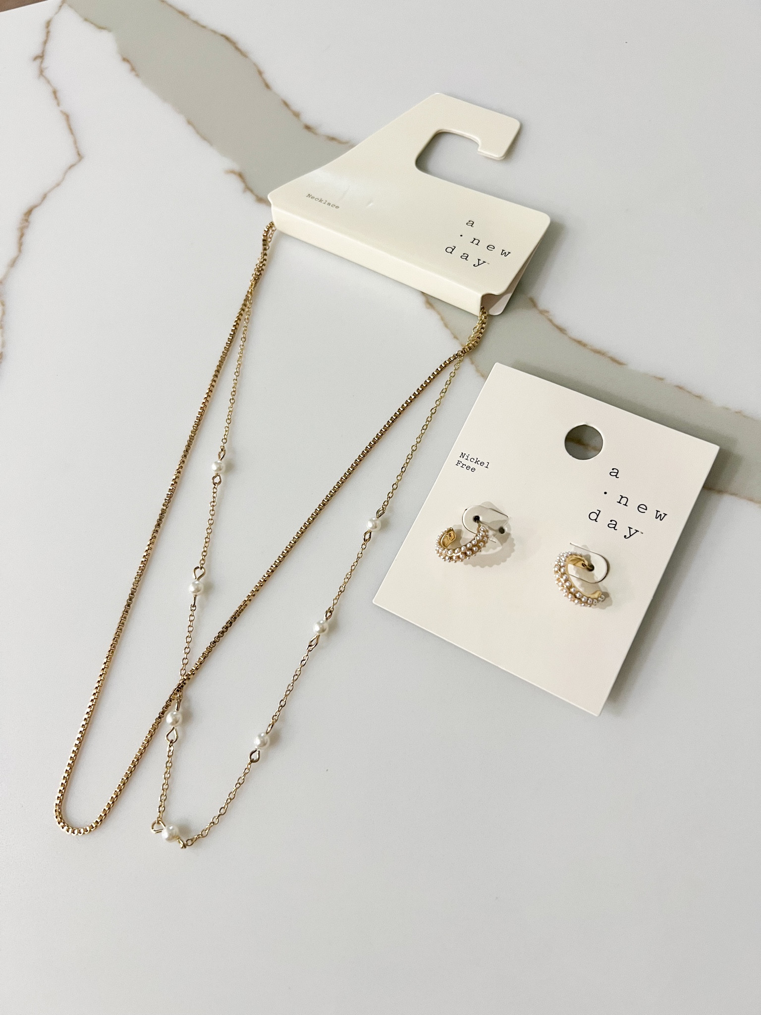 A NEW DAY JEWELRY | TARGET | TARGET FINDS | TARGET ACCESSORIES | TARGET JEWELRY | GOLD AND PEARL NECKLACE | TWO ROW NECKLACE | GOLD AND PEARL EARRINGS | HOOP EARRINGS |  GOLD | PEARL | DAINTY JEWELRY | 

#LTKGiftGuide #LTKMostLoved #LTKfindsunder50