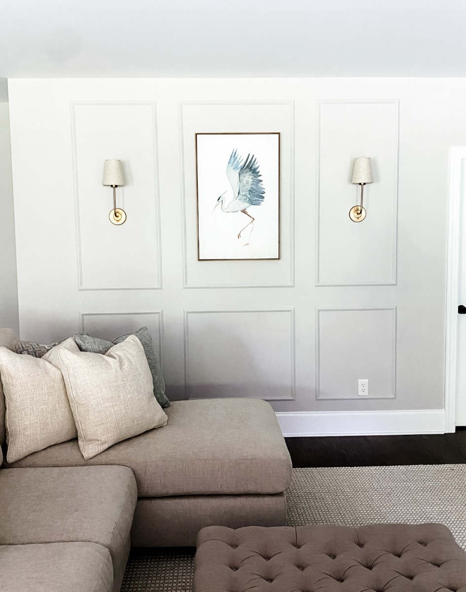 Wall decor and wall artwork, gold sconces, large hand woven cream area rug, tufted square coffee table - living room home decor 

#LTKFind #LTKhome