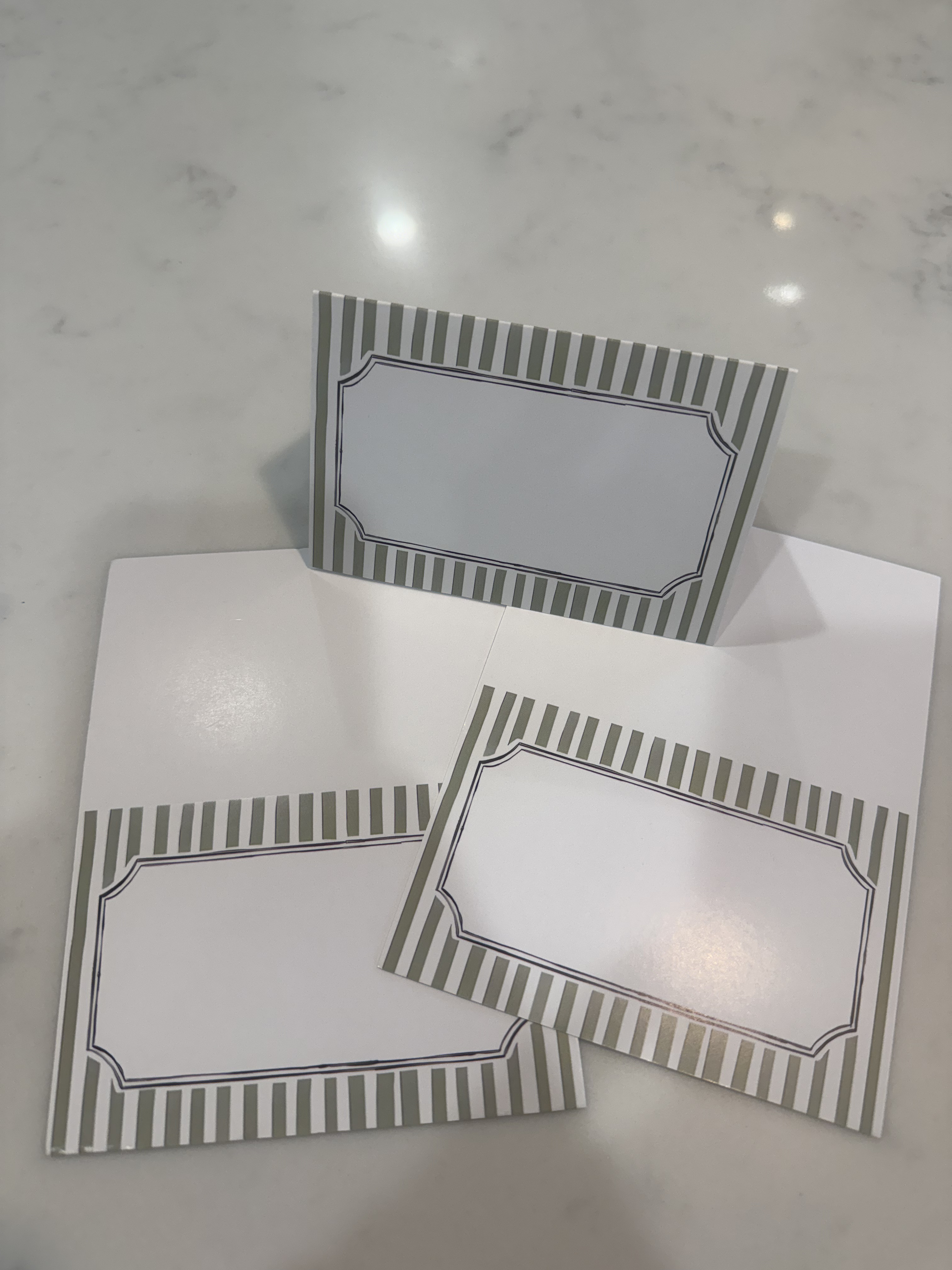 
The perfect size and green stripe for writing my guests' names at their seats.
 

 #LTKWedding