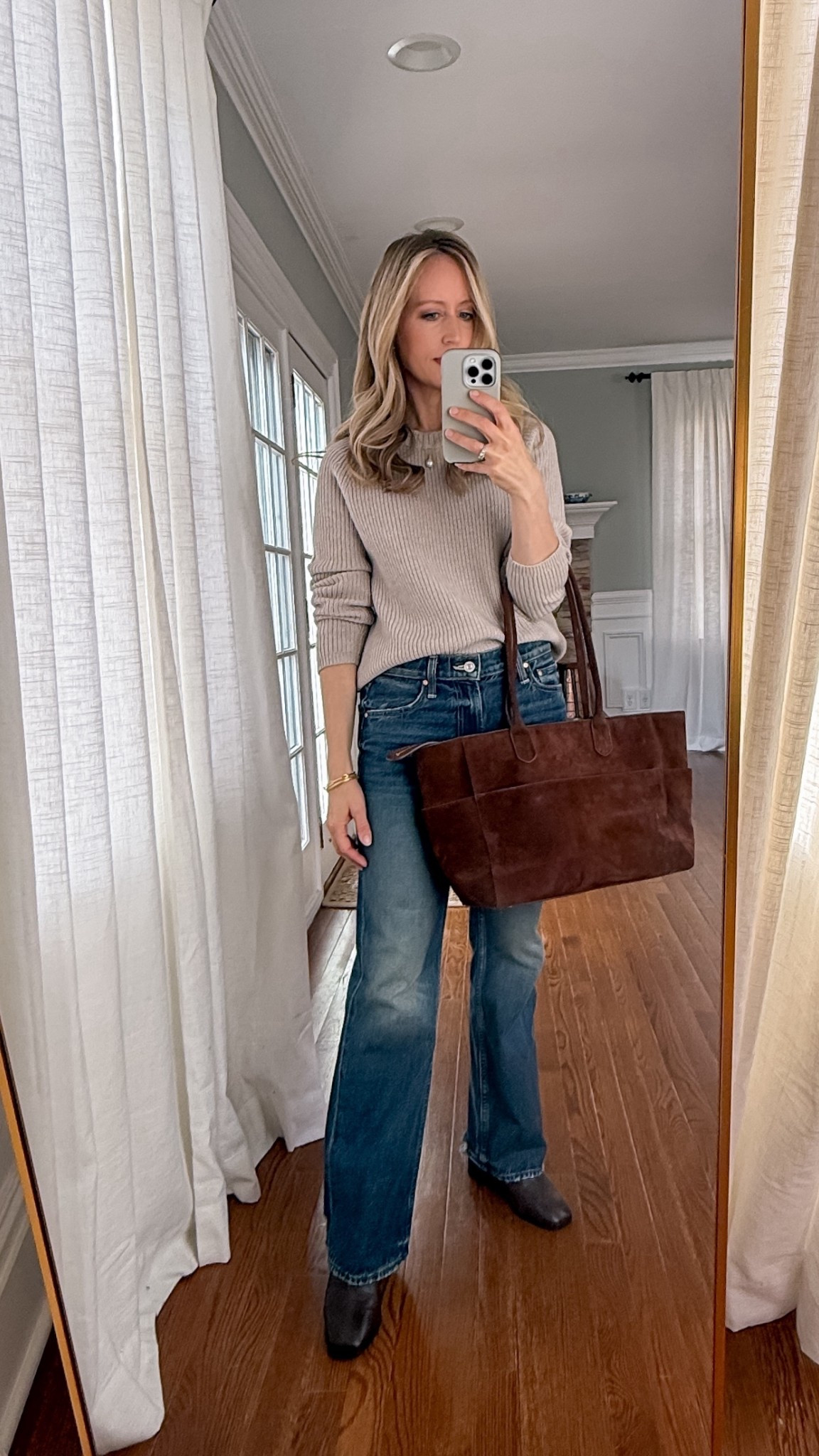 Lunch date outfit. Love these slim wide-leg jeans that hit just right. Runs small do size up. I’m wearing size 25 (I’m size 24 in jeans). Love this neutral sweater - I have it in several colors. And the boots are comfortable right out of the box!


#LTKOver40 #LTKootd #LTKPetite