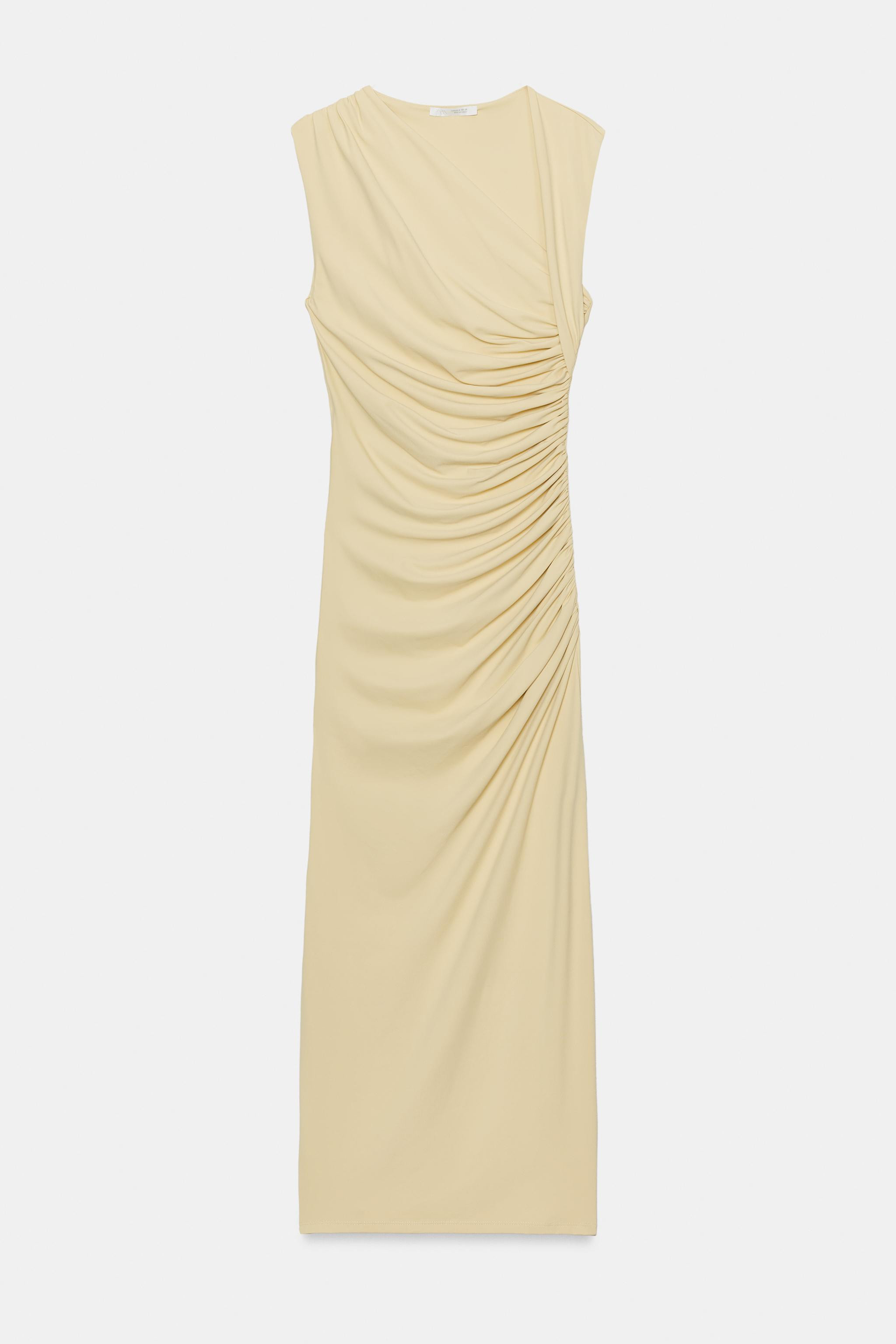 Model height: 174 cmMidi dress with main fabric made of a polyamide blend. Featuring an asymmetri... | Zara UK