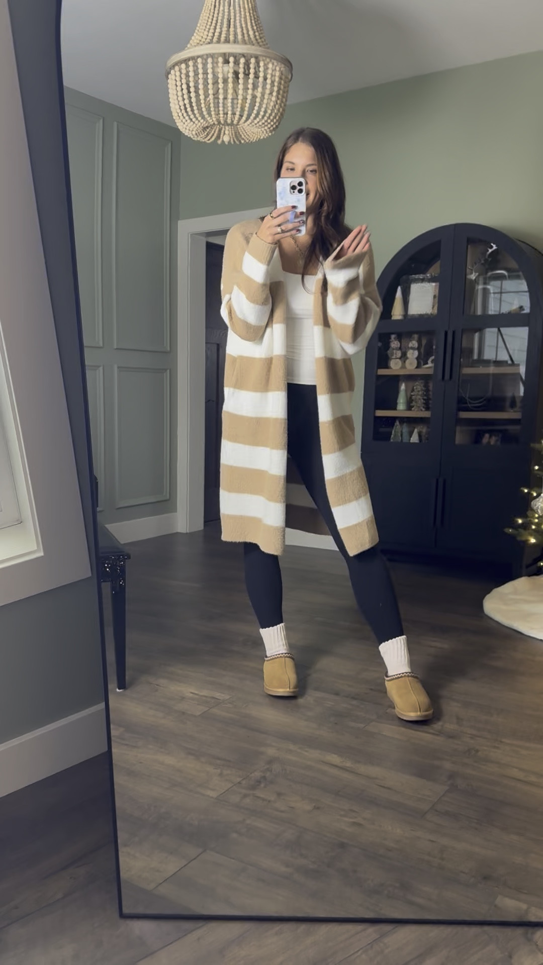 This long cardigan is too cute and so comfy! It pairs perfectly with leggings but can be dressed up with jeans and booties.

Long cardigan, striped cardigan, long length leggings, slippers, tanks, basics, Amazon finds, coin necklace, tall girl approved, Stang and Co

#LTKFindsUnder50 #LTKHoliday #LTKSeasonal
